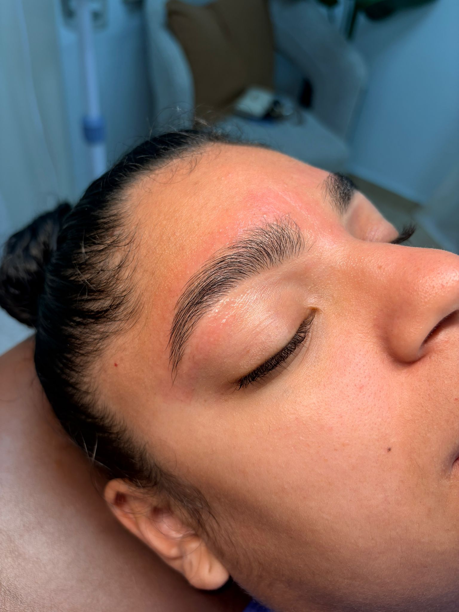 Defined brow and lash result close-up