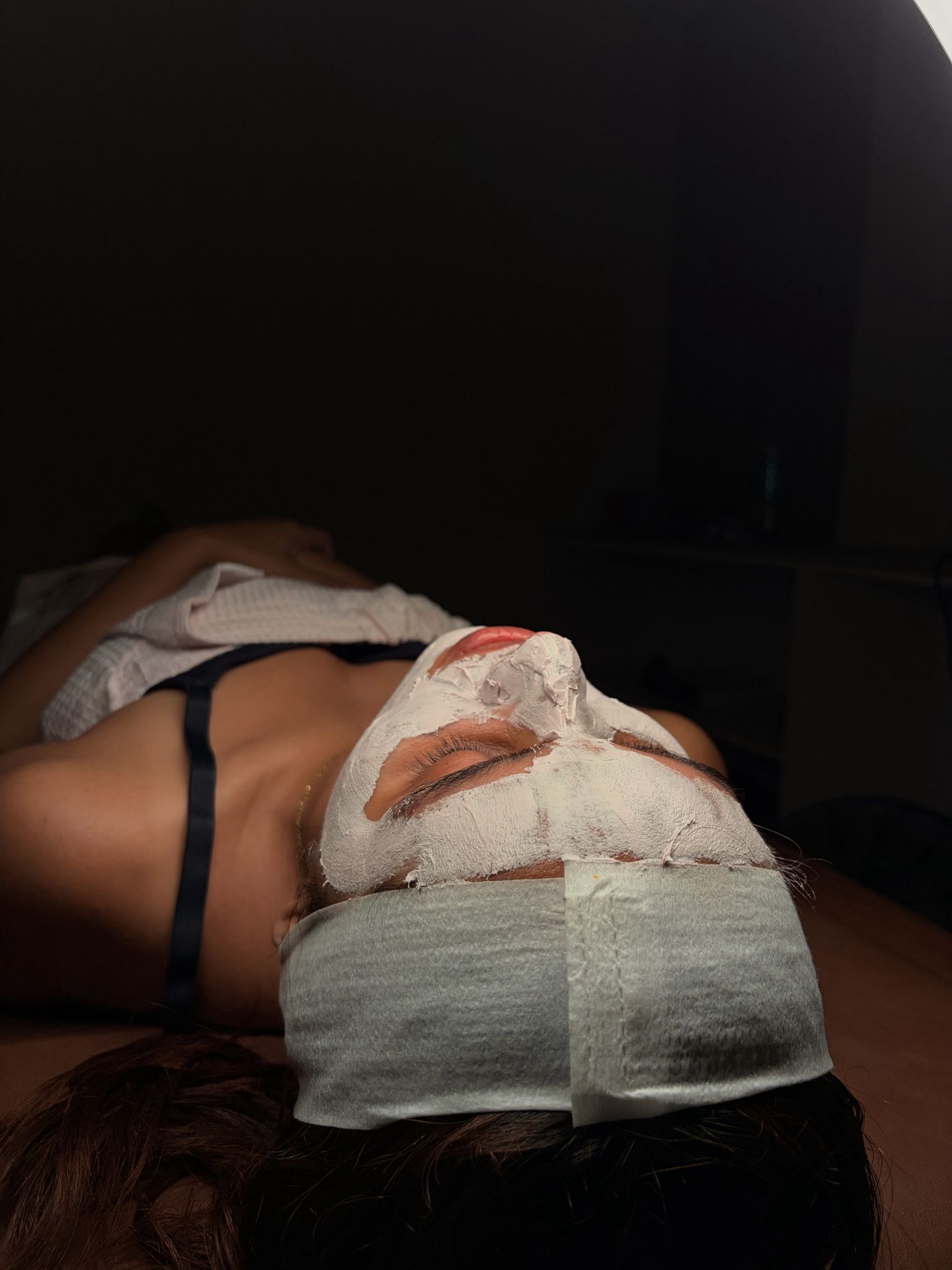 Client during a facial treatment